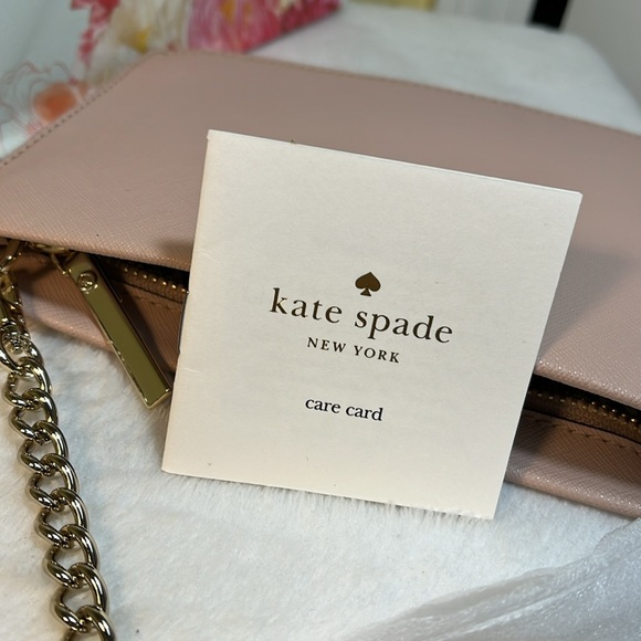 Kate Spade Bag gold name on outside of bag, pink leather, gray and white lining - Picture 2 of 9